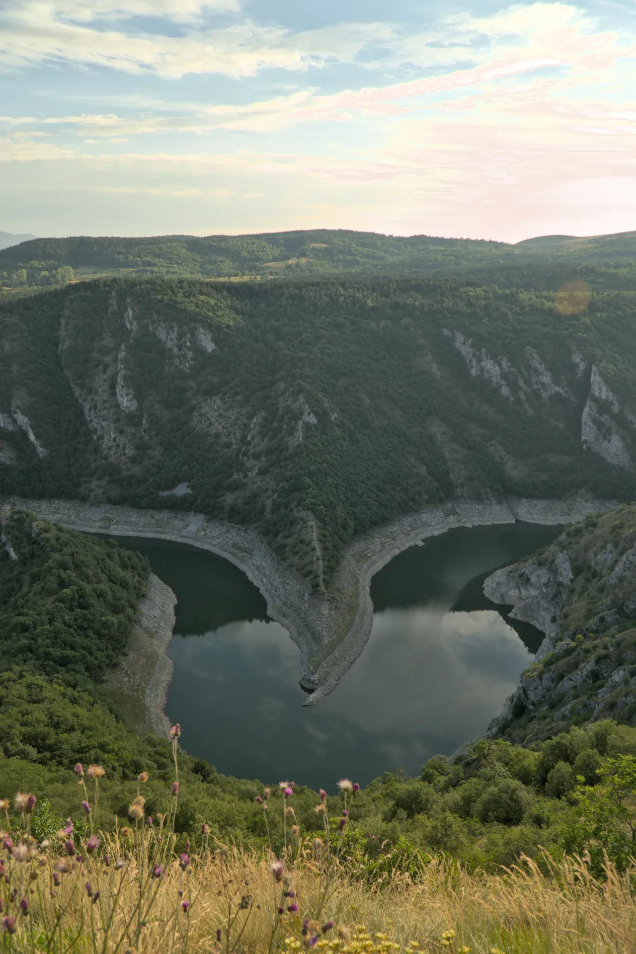 Canyon at dusk, Uvac, Serbia. Vertical landscape photo with river.